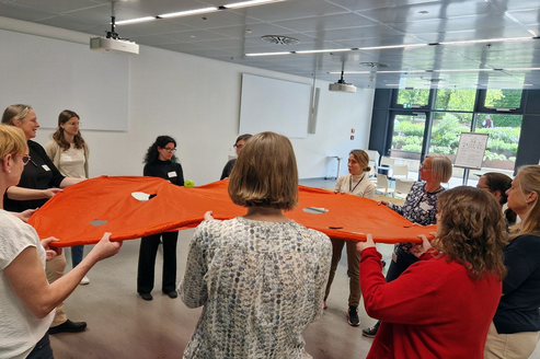 Frauen beim Metalog Fliegenden Teppich